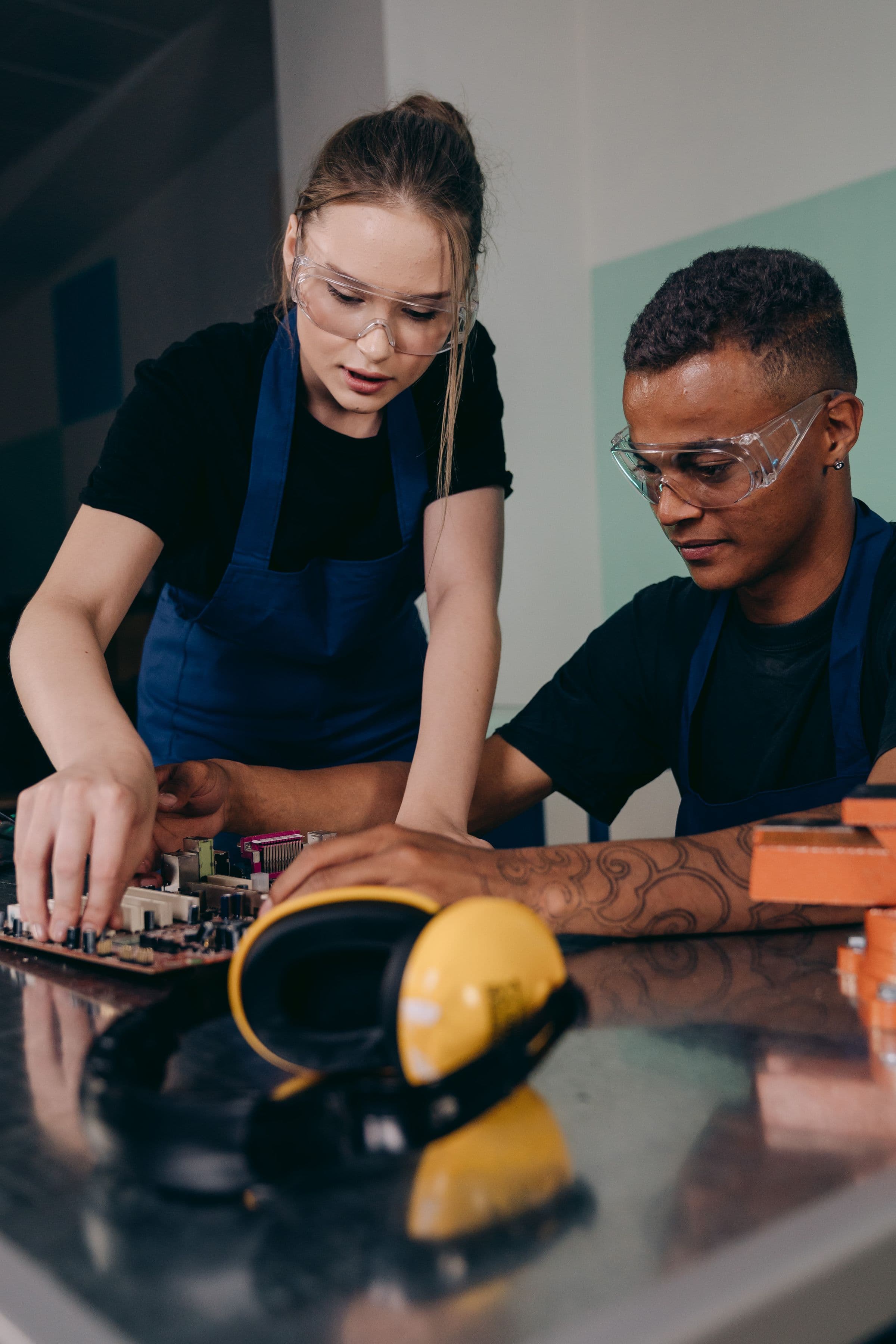 Technology professionals testing enterprise equipment in a modern workspace.