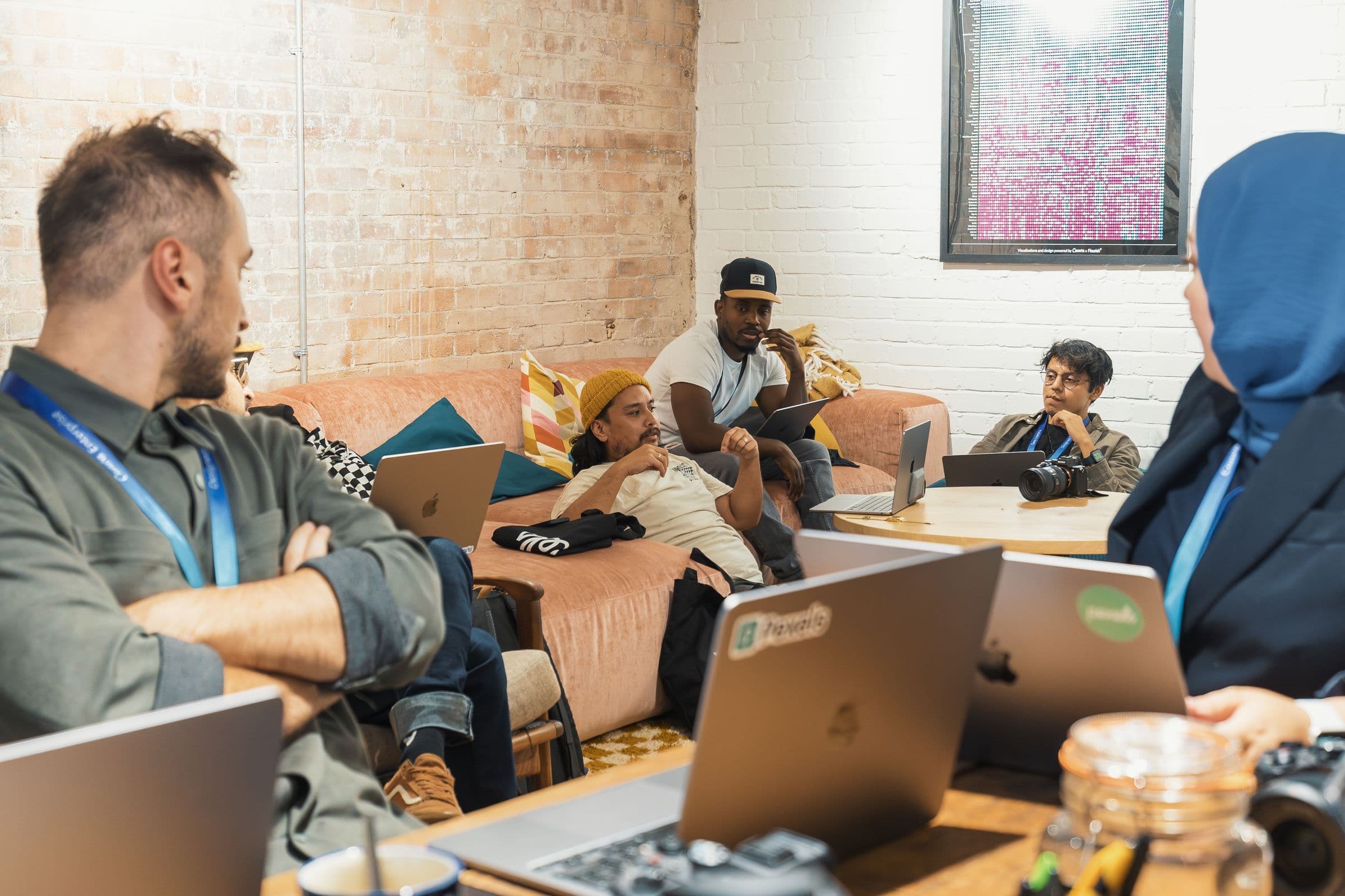 An editorial photograph of a multidisciplinary technology discussion.